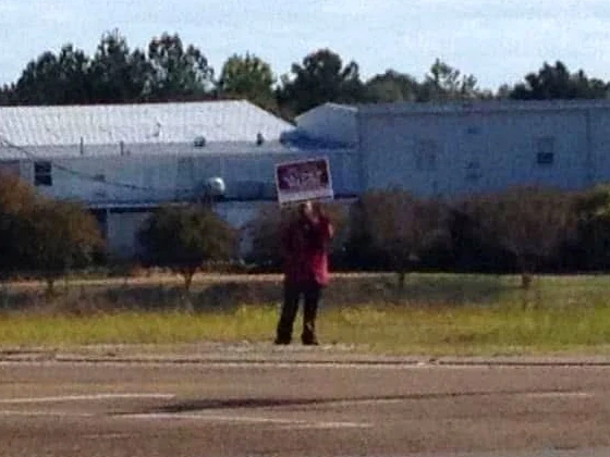 The woman who held Matt Wilson’s campaign sign beside the road during his 2013 special election